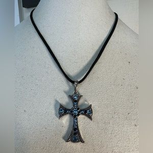 Silvertone cross with blue rhinestones black necklace cord